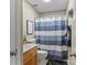 Cozy bathroom featuring a striped shower curtain, and a stylish vanity area at 3757 Fieldhaven Ct, Maiden, NC 28650