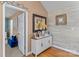 Inviting entryway featuring a white cabinet, decorative mirror, and elegant decor at 3757 Fieldhaven Ct, Maiden, NC 28650
