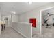 Second floor hallway featuring carpet flooring and views into the exercise room at 393 Brannon Meadows Dr, York, SC 29745