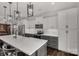 This kitchen offers recessed lighting, stainless steel appliances, white cabinets, and a large island at 393 Brannon Meadows Dr, York, SC 29745