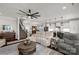 Living room features a ceiling fan, staircase, and comfortable seating at 393 Brannon Meadows Dr, York, SC 29745