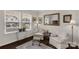 Cozy sitting area with bright natural light, white chairs, and dark hardwood floors at 393 Brannon Meadows Dr, York, SC 29745
