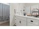 Bathroom features a white vanity, large mirror, and a curtained shower at 4000 Spring Cove Way, Belmont, NC 28012