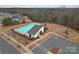 Aerial view of the community pool, playground and recreation area, perfect for Gathering fun at 4000 Spring Cove Way, Belmont, NC 28012