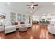 Spacious living room with hardwood floors, vaulted ceiling, and open layout to the kitchen at 4000 Spring Cove Way, Belmont, NC 28012