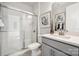 Elegant bathroom featuring a glass shower and a modern vanity at 4004 Caymen Bay Ct, Tega Cay, SC 29708