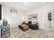 Stylish living room with modern decor, a plush couch, and ample space at 4004 Caymen Bay Ct, Tega Cay, SC 29708