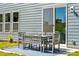 Cozy outdoor patio with seating, ideal for enjoying the backyard and nature at 4004 Caymen Bay Ct, Tega Cay, SC 29708