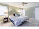 Bedroom with a queen sized bed, ceiling fan and neutral paint color at 435 Caldwell Se Dr, Concord, NC 28025