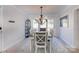 Elegant dining room with a chandelier and large windows, designed for intimate gatherings at 435 Caldwell Se Dr, Concord, NC 28025