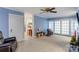 Inviting living room with blue accent walls and French doors leading to the outside at 435 Caldwell Se Dr, Concord, NC 28025