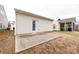 A backyard has a door to the house and a concrete patio at 5216 Crystal Lakes Dr, Rock Hill, SC 29732