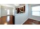 Charming kitchen with wood cabinets, stainless steel appliances, and an adjacent dining area with hardwood floors at 5216 Crystal Lakes Dr, Rock Hill, SC 29732