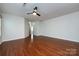 Open living area highlighting hardwood floors, neutral paint, and an open floor plan towards the entry at 5216 Crystal Lakes Dr, Rock Hill, SC 29732