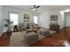 Spacious living room with hardwood floors, stylish furnishings, and plenty of natural light at 5216 Crystal Lakes Dr, Rock Hill, SC 29732