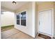 Welcoming porch featuring a neutral color scheme and double windows, creating an inviting entryway to the home at 5216 Crystal Lakes Dr, Rock Hill, SC 29732