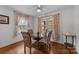 Charming dining room with a glass-top table and patterned chairs at 616 W D Ave, Salisbury, NC 28144