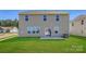The home features a spacious backyard with a patio, perfect for outdoor entertaining at 6265 Fairfax Ct, Maiden, NC 28650