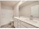 Bathroom with double sinks, a large mirror, and a tub/shower combination at 6265 Fairfax Ct, Maiden, NC 28650
