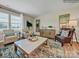 Inviting living room with comfortable seating, stylish decor and abundant natural light at 6265 Fairfax Ct, Maiden, NC 28650