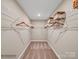Well-organized walk-in closet with ample shelving for storage at 6265 Fairfax Ct, Maiden, NC 28650