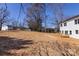 Wooden deck overlooks the expansive back yard at 119 Ethel Dr, Stanley, NC 28164