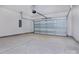 A spacious garage with a new white door at 119 Ethel Dr, Stanley, NC 28164