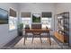 Brightly lit home office setup with modern desk and built-in shelving at 119 Ethel Dr, Stanley, NC 28164
