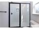 Modern bathroom shower featuring black trim and white subway tile at 119 Ethel Dr, Stanley, NC 28164