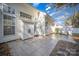 Home exterior with a tile patio and a view of the backyard at 151 Kallie Loop, Mooresville, NC 28117