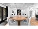 Bright living room with a fireplace, modern furniture, and coffered ceiling at 1575 Shinnville Rd, Cleveland, NC 27013