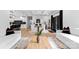 Open concept living space featuring bright dining area, living room, and a modern kitchen at 1575 Shinnville Rd, Cleveland, NC 27013