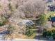 Aerial view of the home featuring mature trees and a well maintained lawn at 1601 South Point Rd, Belmont, NC 28012