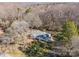 A beautiful home with a large yard, lush green grass, and mature trees in a peaceful suburban setting at 1601 South Point Rd, Belmont, NC 28012