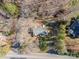 Overhead drone view of a well-maintained house with a new roof, mature landscaping, and a quiet neighborhood at 1601 South Point Rd, Belmont, NC 28012