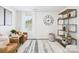 Cozy living room featuring stylish furniture, large windows, and modern decor at 1720 Coral Bark Ln # Kh15, Charlotte, NC 28216