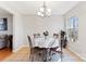 Cozy dining area with views of the exterior, seating for four, and modern light fixture at 1811 Endeavor Ln, Clover, SC 29710