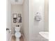 Traditional powder room with framed art and a pedestal sink at 1811 Endeavor Ln, Clover, SC 29710