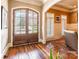 Foyer featuring a hardwood floor, glass-paned double doors and natural light at 1996 Farrow Dr, Rock Hill, SC 29732