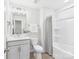 A well-lit bathroom featuring modern fixtures, clean design, and efficient use of space, enhancing its appeal at 2009 White Cypress Ct # Kh13, Charlotte, NC 28216