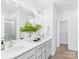 Modern bathroom with double sink vanity, a large mirror, and ample counter space at 2009 White Cypress Ct # Kh13, Charlotte, NC 28216