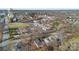 Aerial view shows homes near an industrial area, and water tower in the distance at 208 W Lafayette St, Salisbury, NC 28144