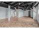 Spacious basement featuring modern lighting, painted walls, and hardwood floors at 208 W Lafayette St, Salisbury, NC 28144