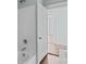 Bathroom with a white tub and shower and a door that leads to the bedroom at 208 W Lafayette St, Salisbury, NC 28144