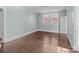 Bright bedroom featuring hardwood floors, and neutral walls at 208 W Lafayette St, Salisbury, NC 28144