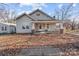 A charming one-story home with a cozy front porch and well-maintained yard at 208 W Lafayette St, Salisbury, NC 28144