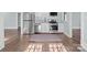Kitchen showcasing stainless steel appliances, modern cabinets, and hardwood floors at 208 W Lafayette St, Salisbury, NC 28144