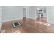 Open-concept kitchen and living area with stainless steel appliances and ample natural light at 208 W Lafayette St, Salisbury, NC 28144