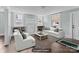 Bright, virtually staged living room featuring hardwood floors at 208 W Lafayette St, Salisbury, NC 28144