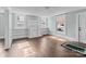 Bright living room featuring hardwood floors, and classic white trim at 208 W Lafayette St, Salisbury, NC 28144